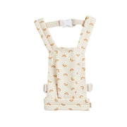 A rainbow-patterned Olli Ella Doll Carrier with padded straps designed for carrying dolls.